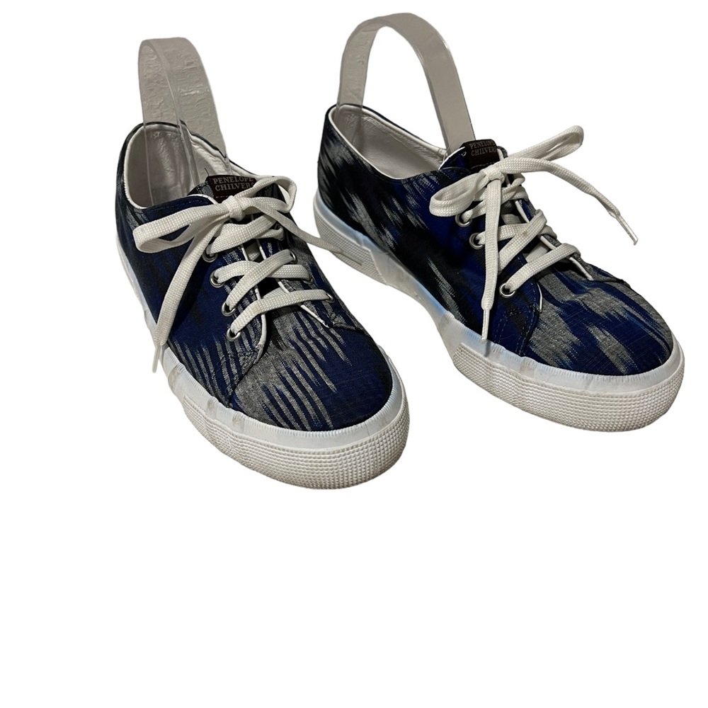Penelope Chilvers blue and white sneakers